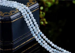 Macro shot of faceted light blue aquamarine gemstone beads for jewelry making