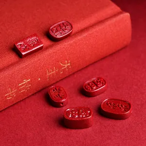 Perles de cinabre rouge gravées avec symboles de chance pour bijoux et bracelets
