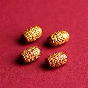 Golden barrel beads with red cinnabar pattern for DIY jewelry and ethnic bracelets