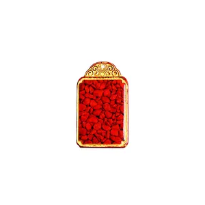 Traditional cinnabar crystal pendant with gold filigree and auspicious symbol