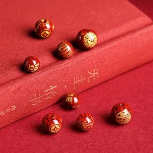 Polished cinnabar loose beads with gold engraved bagua and coin patterns for DIY jewelry
