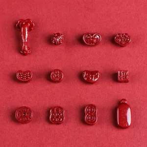 DIY Cinnabar charms featuring Ruyi and Fortune bag designs for red jewelry making