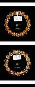 Detailopname van 12mm en 12,5mm natuurlijke citrien armbanden met diepgele ronde kralen