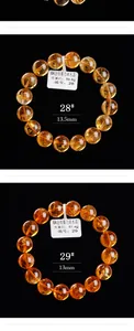 Detailopname van 13,5 mm natuurlijke citrien armbanden met zichtbare interne texturen