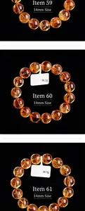 Macro-opname van 14mm natuurlijke citrien kwarts kralenarmbanden met diepe gouden tint