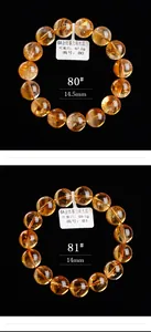 Macro-opname van 14mm natuurlijke citrienkralen met gouden transparantie en textuur