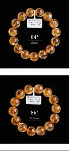 Macro-opname van 15mm 6A citrien kristallen armbanden met natuurlijke ijsscheuren
