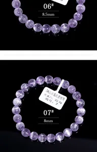 Nahaufnahme von Kunzit-Armbändern mit Katzenaugeneffekt und 8,5-mm-Perlen