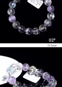 Macro detail of 11.5mm natural multi-color kunzite beads with cat eye effect