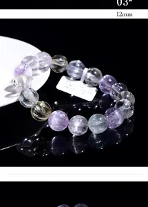 Macro shot of 12mm natural cat eye kunzite beads with silk luster and high clarity