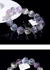 Macro detail of 7A grade cat-eye kunzite bracelets showing weight and silk luster