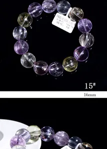 Macro detail of 16mm 7A grade multicolored kunzite bracelet with cat's eye effect