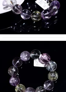 Macro shot of 7A natural cat eye spodumene crystal beads with silky fiber texture