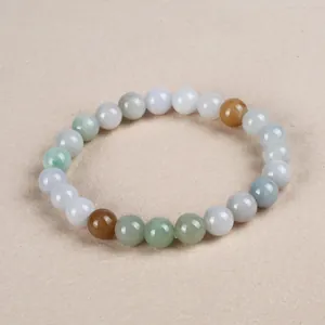 Macro shot of natural jadeite beaded bracelet showing smooth texture and colorful beads