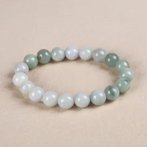 Natural jadeite beaded bracelet with elegant light green and lavender smooth round stones