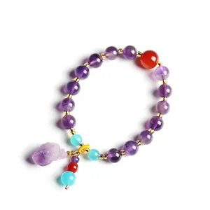 Natuurlijke amethist kralenarmband met ruwe kristalcluster en bohemien accenten