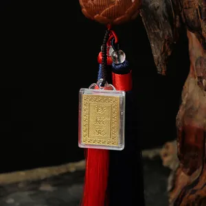 Perla di loto in legno con ciondolo Shurangama Mantra dorato e nappe di seta decorative