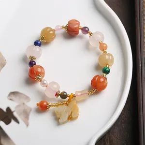 Natural gold silk jade pumpkin bead bracelet with colorful gemstones and pendant