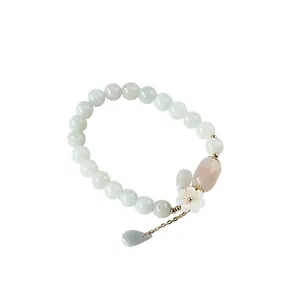 Natural jadeite beaded bracelet with 14K gold-filled shell flower and leaf pendant
