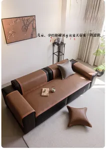 Detail of a brown woven rattan sofa cover set with anti-slip backing for summer