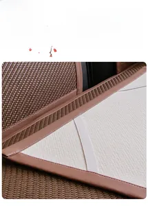 Detail of breathable ice rattan sofa cushion with non-slip silicone backing and elastic strap