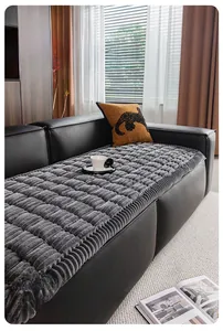Detailed texture of thick dark grey corduroy sofa cushion with non-slip backing