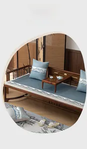 Close-up of blue-grey ice silk sofa mat with landscape pattern and anti-slip silicone backing