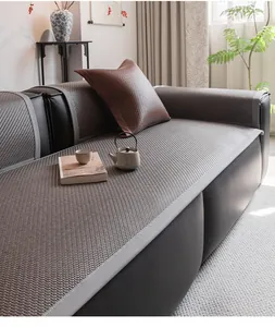 Detailed view of grey ice vine summer sofa mat with cooling woven texture and binding