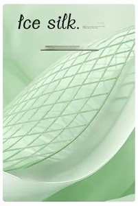 Close-up of mint green ice silk sofa cover fabric with quilted diamond lattice texture