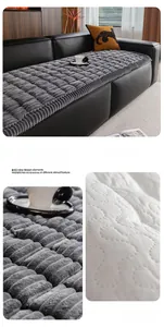 Detail of grey flannel sofa cover showing striped texture and quilted backing