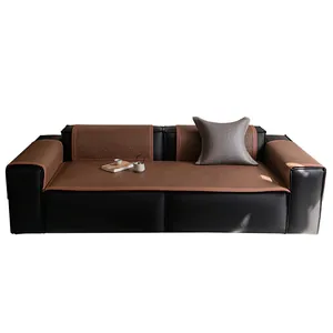 Cooling PE rattan sofa cover set with woven brown texture on a black leather sofa