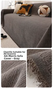 Close-up of dark grey chenille sofa cover fabric featuring fringe and woven texture