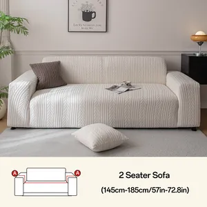 Detail van crème witte 2-zits bankhoes met gestructureerd jacquard gebreid patroon