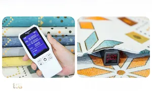 Macro view of air quality monitor testing formaldehyde and TVOC on chenille fabric cover