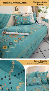 Macro shot of mint green chenille sofa cover fabric featuring geometric snowflake patterns