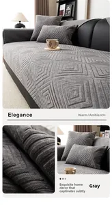 Close-up of gray chenille sofa cover with geometric 3D square texture and matching pillow