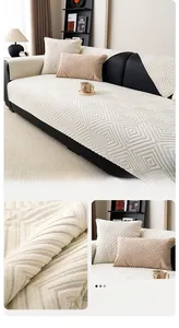 Detail of off-white chenille sofa cushion with geometric diamond texture and thick fabric