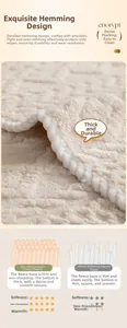 Close-up of thick beige jacquard fleece sofa cover with refined hem and dense texture