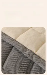 Detail of chenille sofa cushion with herringbone pattern and non-slip silicone backing