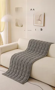 Detailed view of grey chenille sofa cover showing thick quilted fabric and soft texture