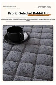 Detail of dark grey faux rabbit fur sofa cover with textured checkerboard pattern