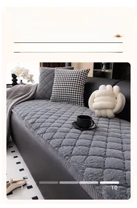 Detail view of grey quilted plush sofa cushion with 3D diamond texture and winter warm fabric