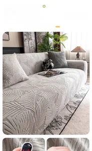 Detail of grey elastic sofa cover with 3D palm leaf texture and eco-friendly test result