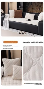 Macro detail of creamy white rabbit fur plush sofa cushion with quilted diamond pattern