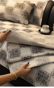 Detail of high-quality black and white checkered textured fabric sofa cover