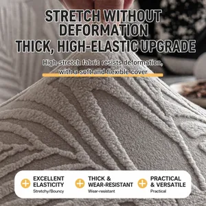 Copridivano beige elastico con motivo a foglie che mostra l'elevata elasticità del tessuto