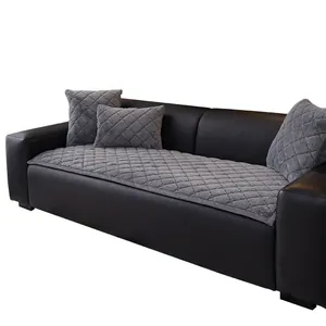 Quilted dark grey plush sofa cover and matching pillows set for winter comfort