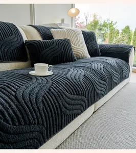 Close-up of thick plush sofa cover with 3D wave texture and non-slip velvet fabric