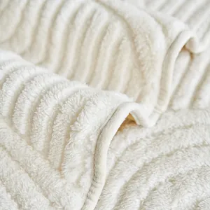 Thick velvet sofa cover with non-slip vertical stripes in cozy cream white plush fabric