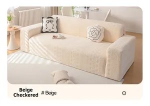 Detail view of beige checkered elastic sofa cover showing geometric knitted texture